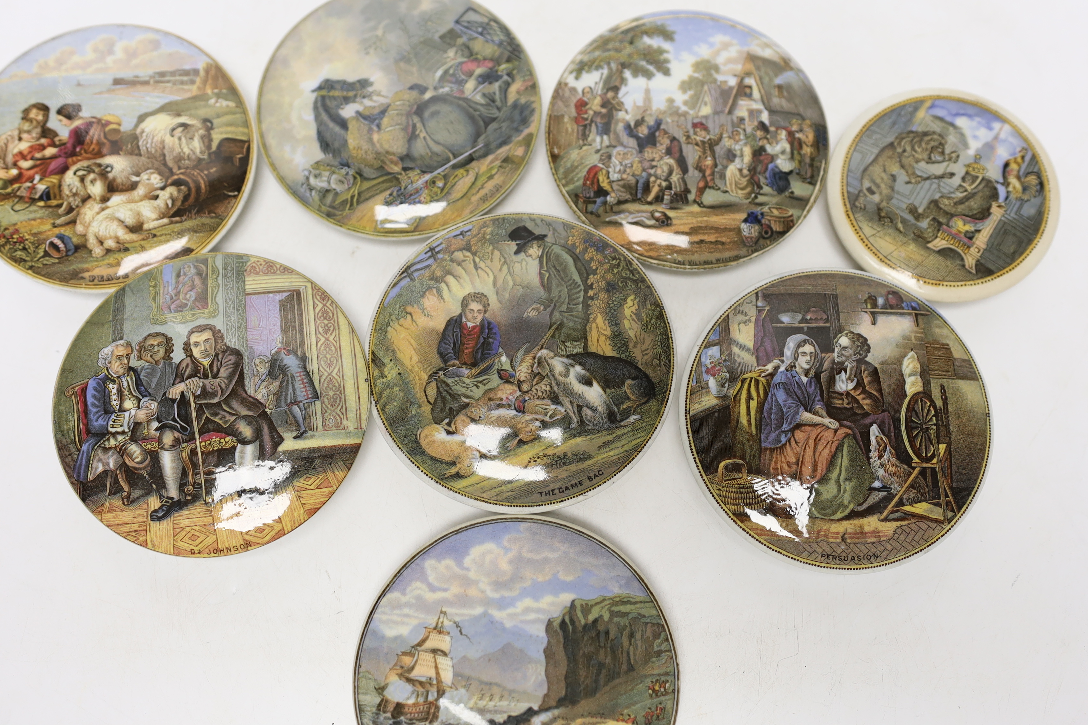 Eight Victorian ceramic Prattware pot lids
